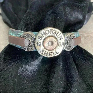 Western 12 gauge shell casing hammered metal base leather adjustable strap